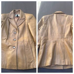 Vintage Neiman Marcus Exclusive Lamb leather jacket 
Pit to pit: 19”
Length: 26”